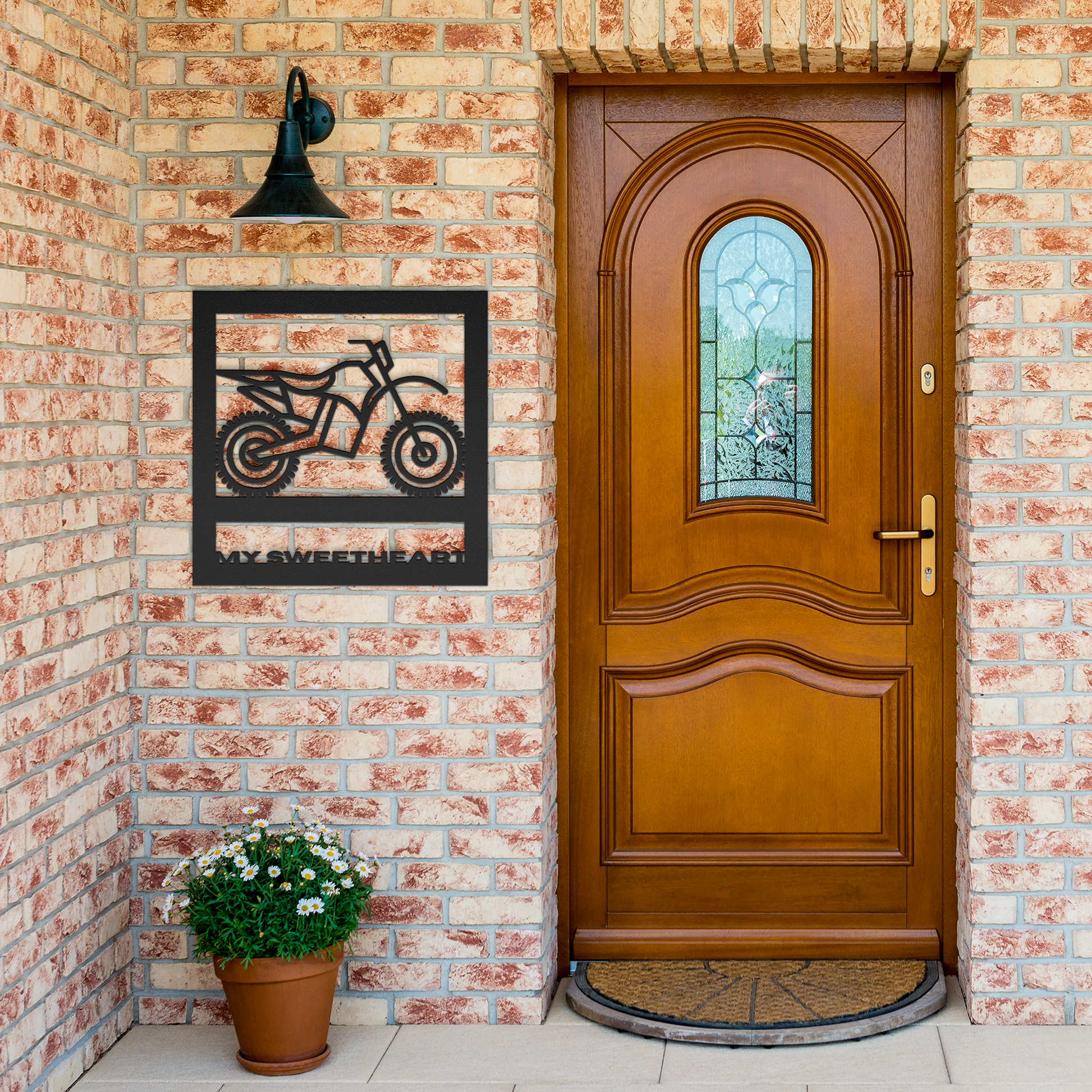 Hypnotic_Metal_Wall_Art_Dirt_Bike_Frame_Black_Brick_Entrance_Mockup.png